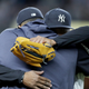 Sabathia embraces Dellin Betances after being removed from his last regular-season home start.